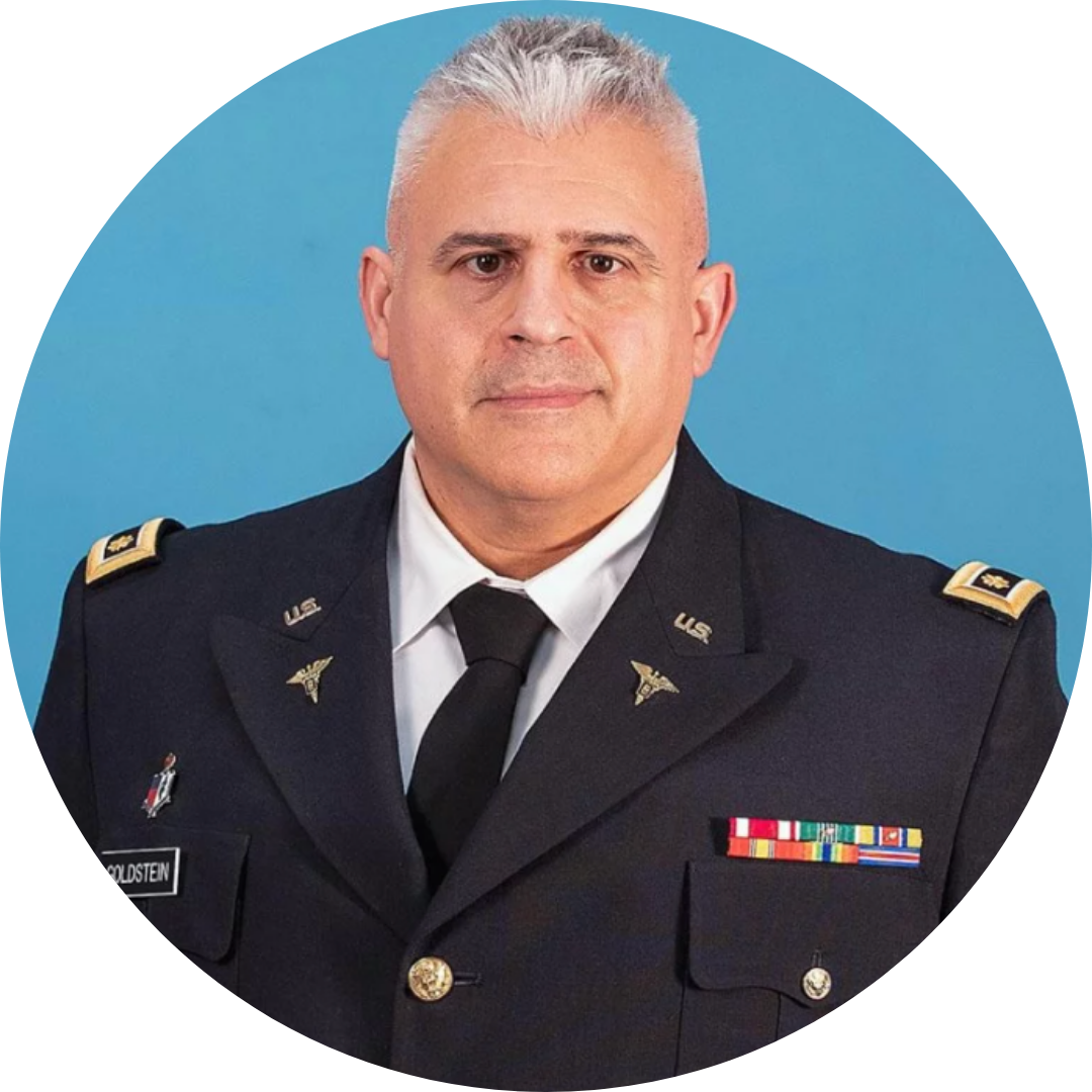 Professional headshot of Dr. Brian Goldstein, DDS, Periodontist, in military dress uniform