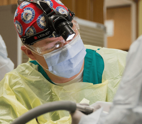 Dentist doing procedure in facility