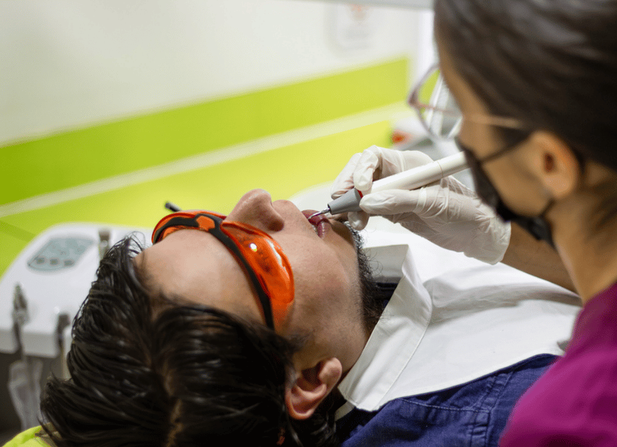 Dentist doing root canal
