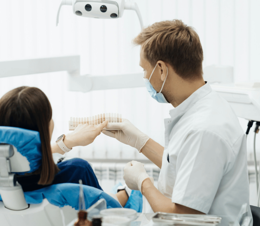 Dentist holding up tooth samples