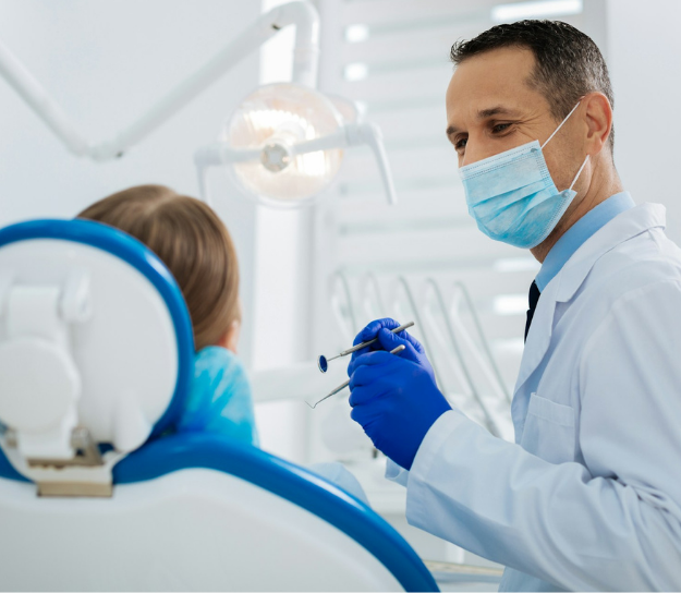 Dentist smiling with patient