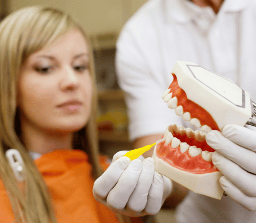 Denture showing to patient aftercare