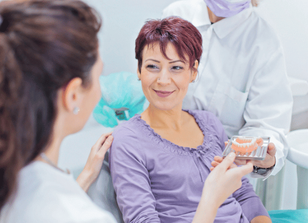 Denture showing