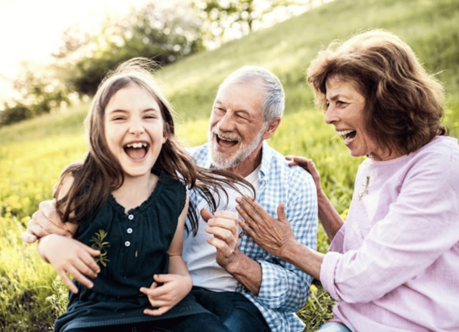 Happy family in a field 1