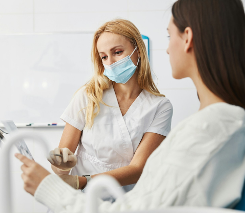 Patient with dentist discussing next steps