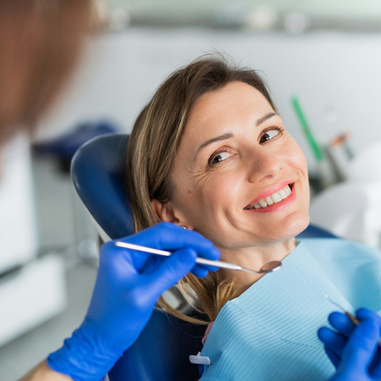 woman at the dentist smiling