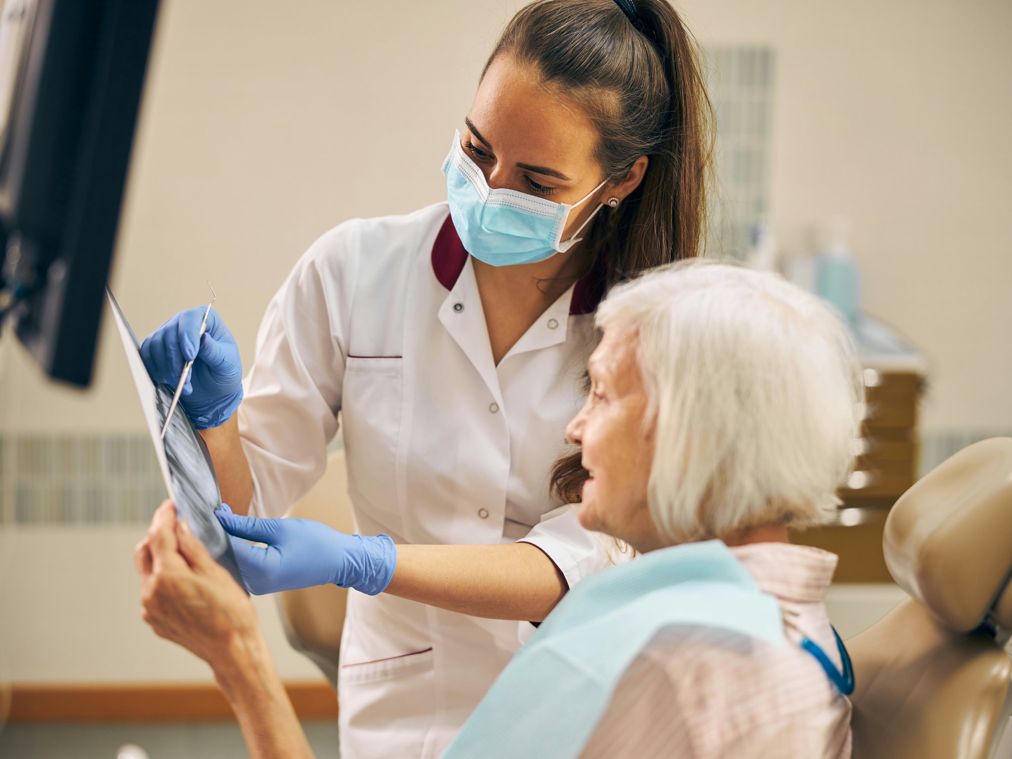 Patient looking at scanned dental images