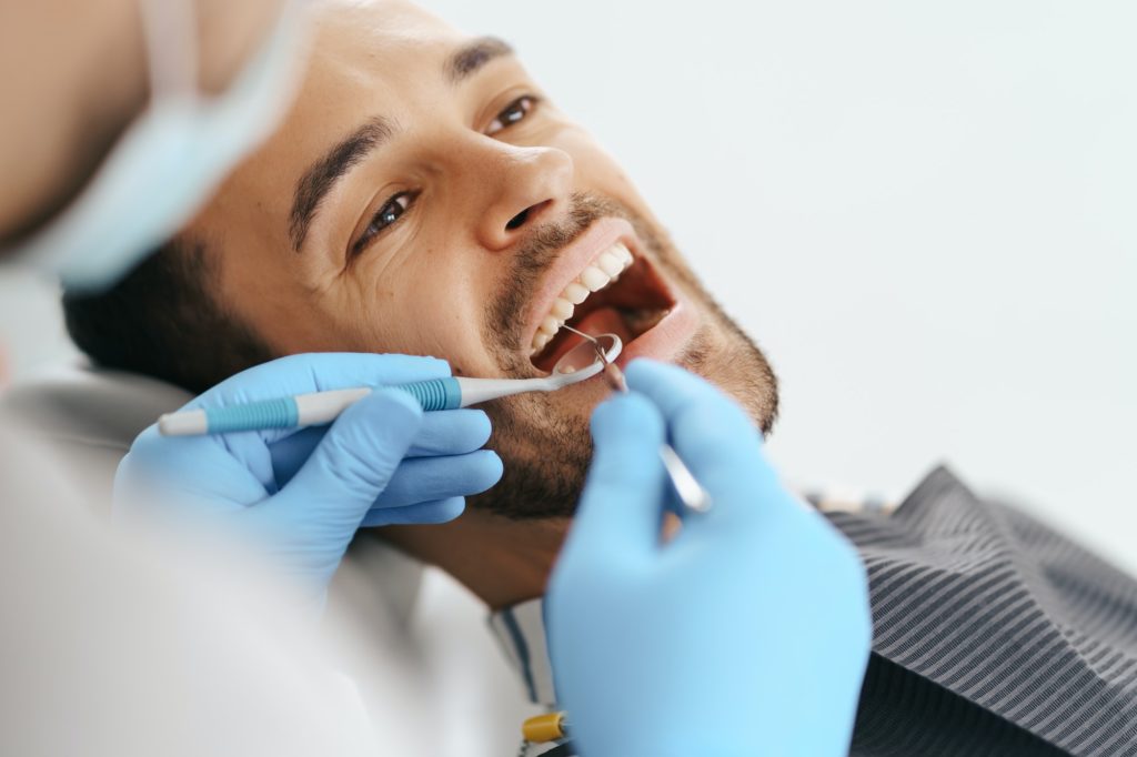 Patient male at dentist