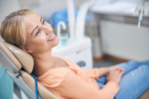 Smiling young woman waiting for dental procedures